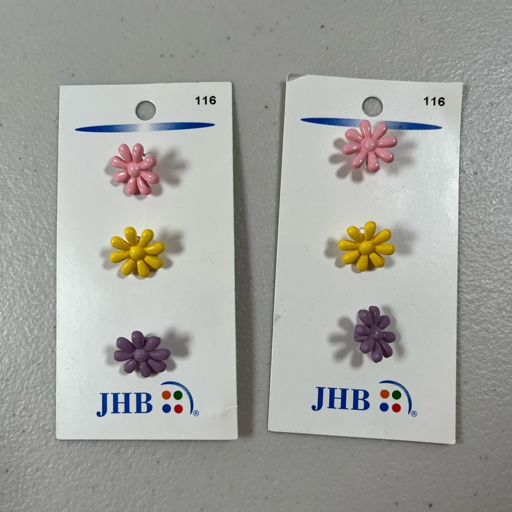 Vintage JHB buttons.  Flower shaped. Pastel colors NEW